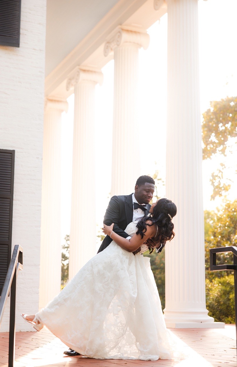 Groom H standing at altar before ceremony at Woodbine Mansion