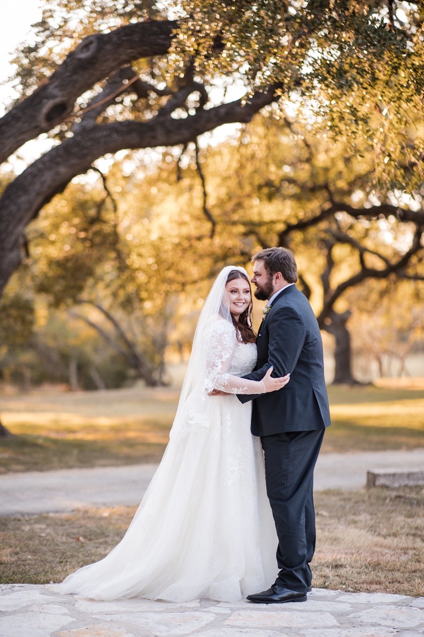 Bride and groom walking back down aisle at Old Glory Ranch Wimberley