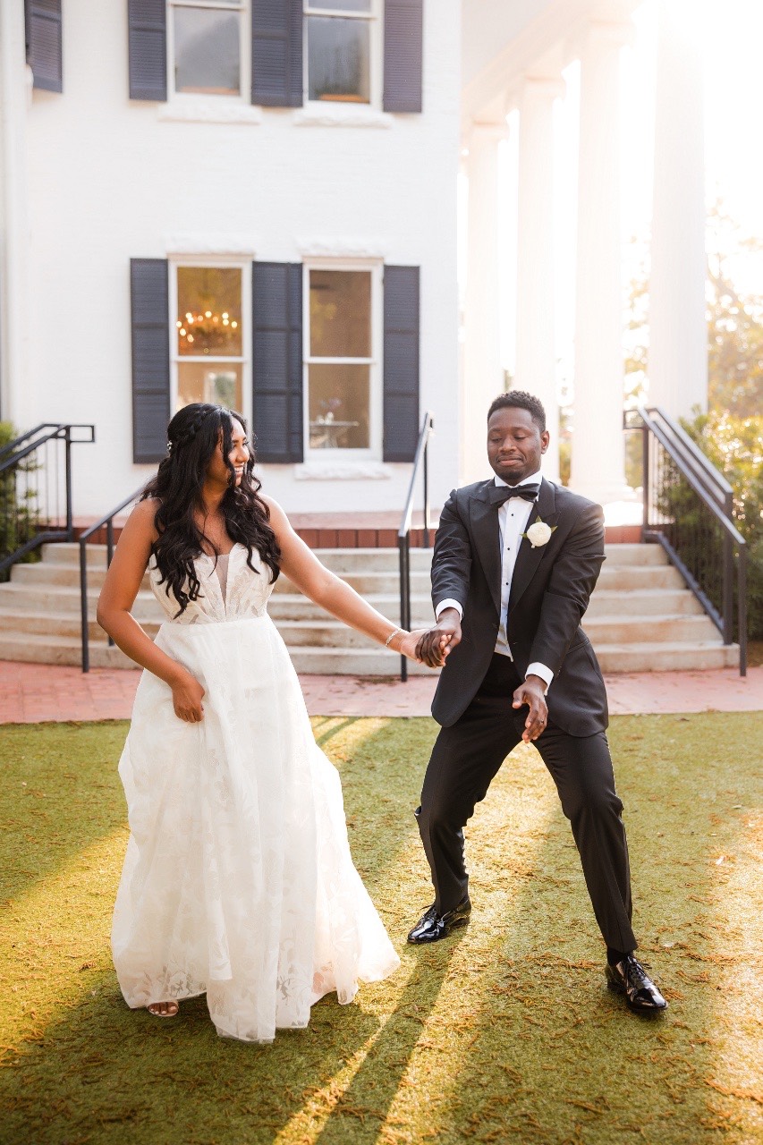 Ceremony setup at Woodbine Mansion Round Rock with floral arrangements