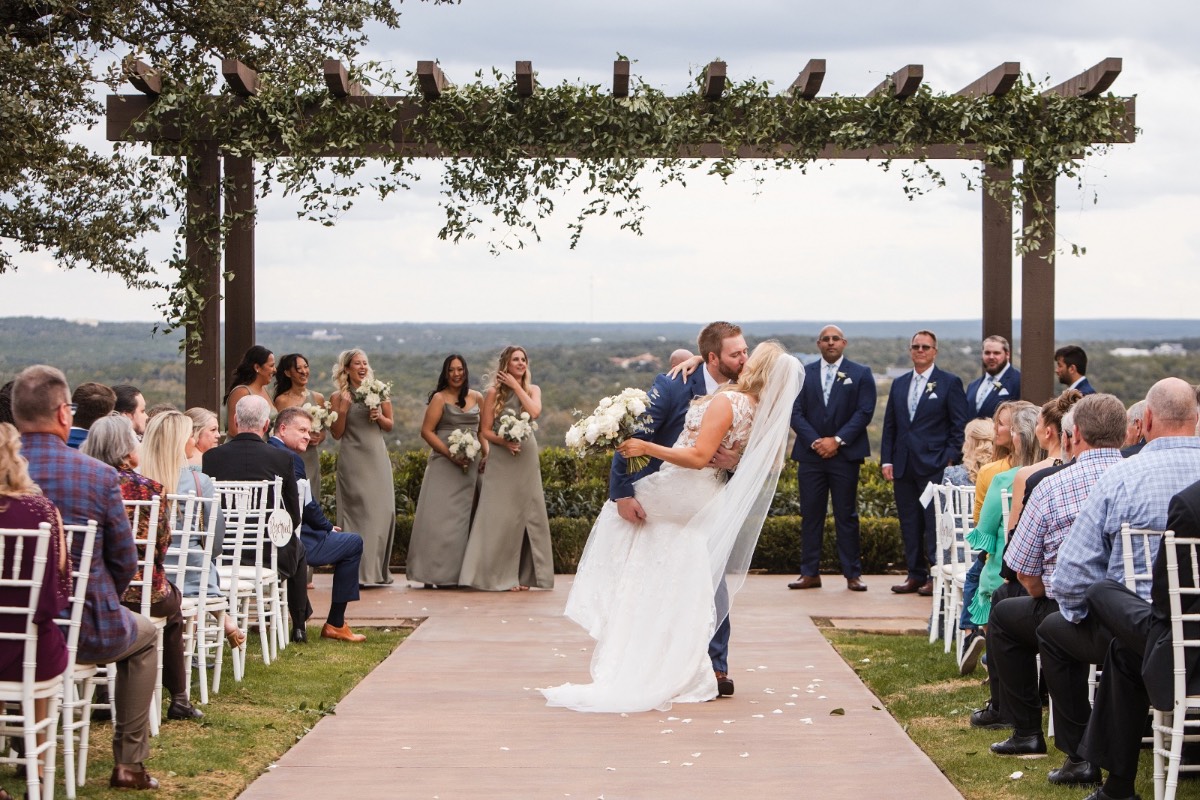 Bride and groom photographed during first look at Canyonwood Ridge winter venue