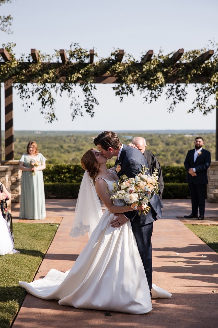Emotional ceremony moment as O and C exchange vows at Canyonwood Ridge