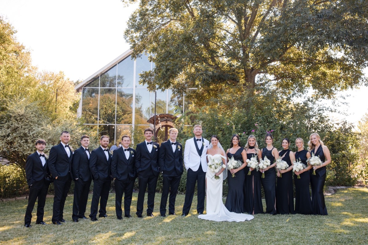 Ceremony setup at Barr Mansion with seasonal flowers by Poppy Flowers for fall wedding