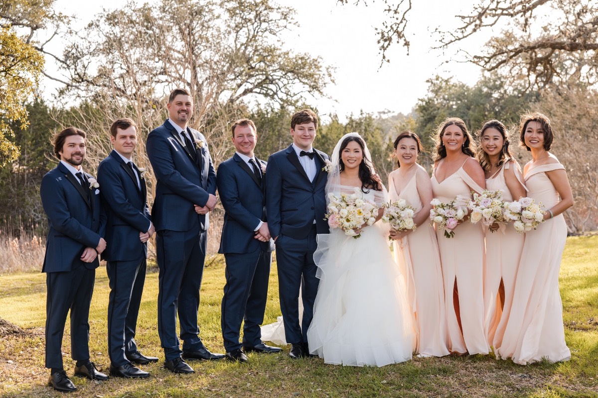 Best man and groomsmen with groom M at Pecan Springs Ranch wedding