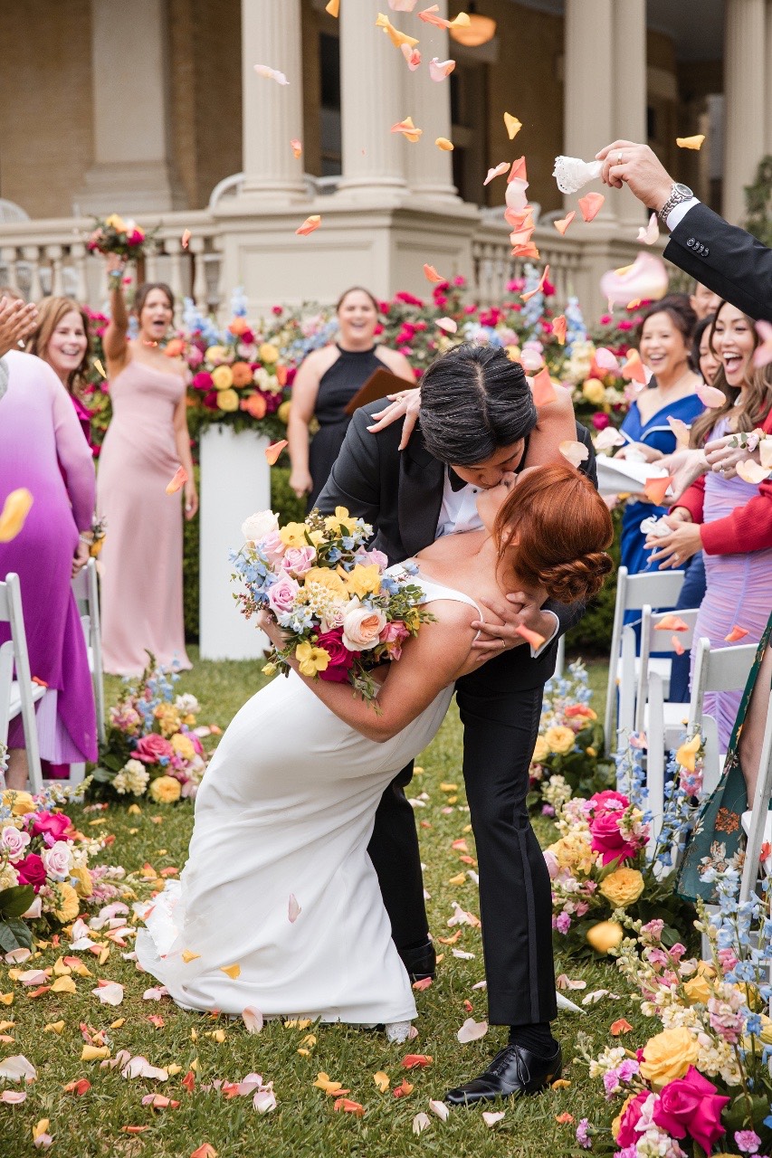 K and A exchanging vows at Hotel Ella ceremony