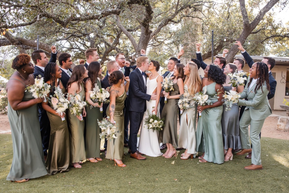 Bride and groom's first walk as married couple at Balcones Springs