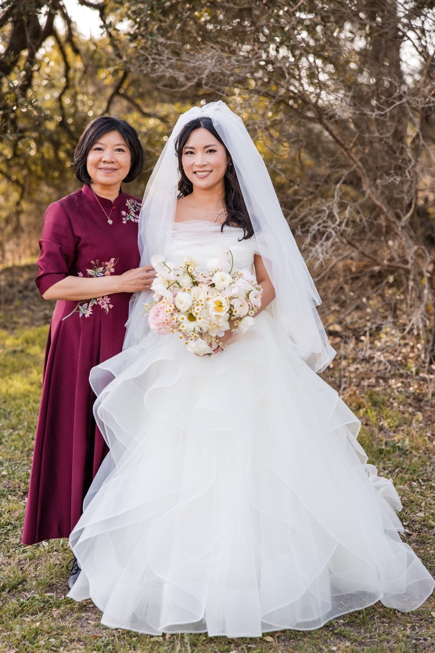 L and M posing together for Pecan Springs Ranch wedding photographer portraits