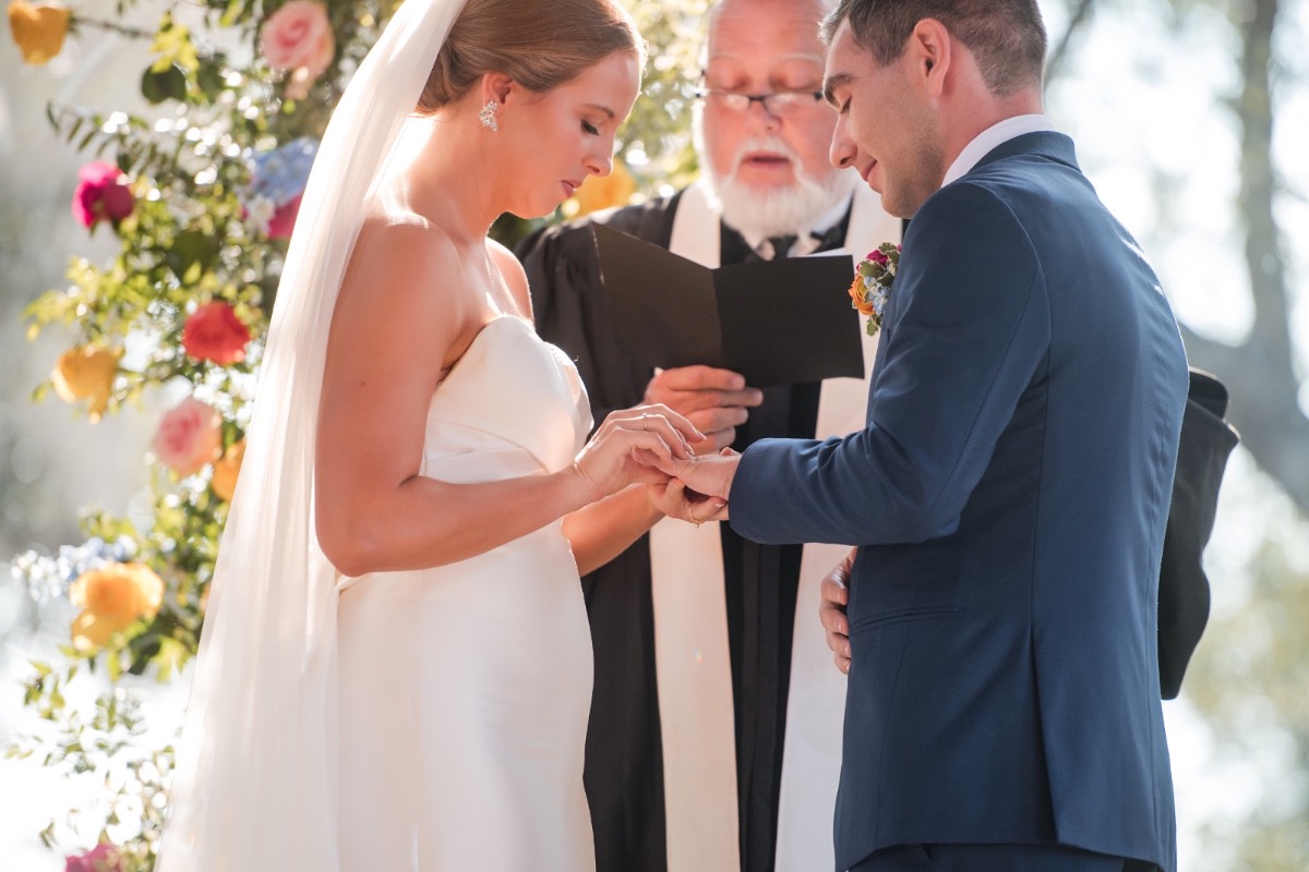 Couple portraits at Canyonwood Ridge Dripping Springs with golden hour lighting