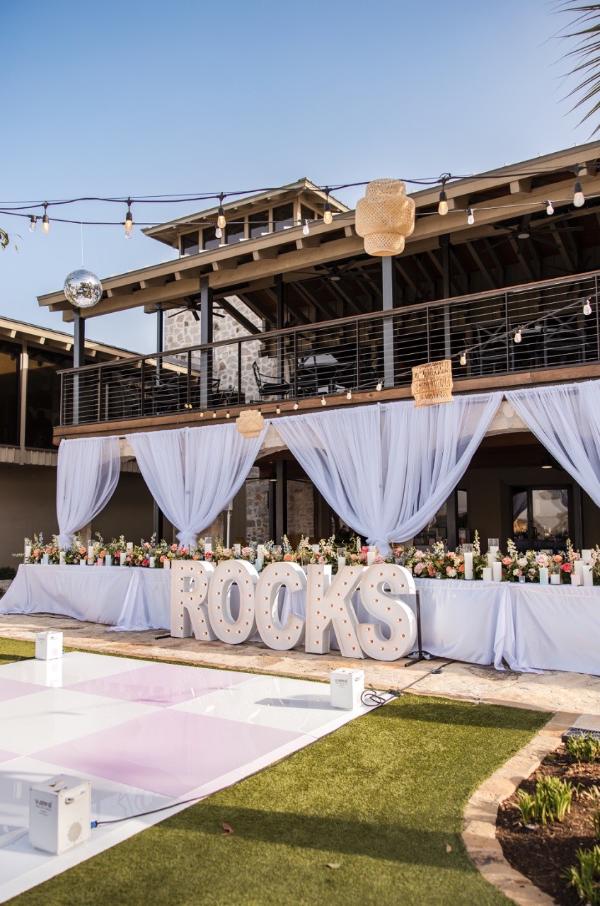 Wedding guests applaud S and A leaving Horseshoe Bay Resort ceremony
