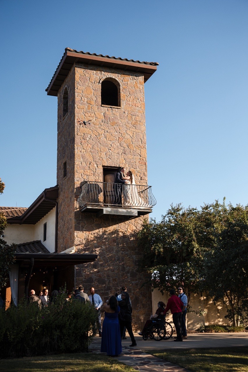 Recessional of newlyweds walking through guests at Dripping Springs Texas ceremony