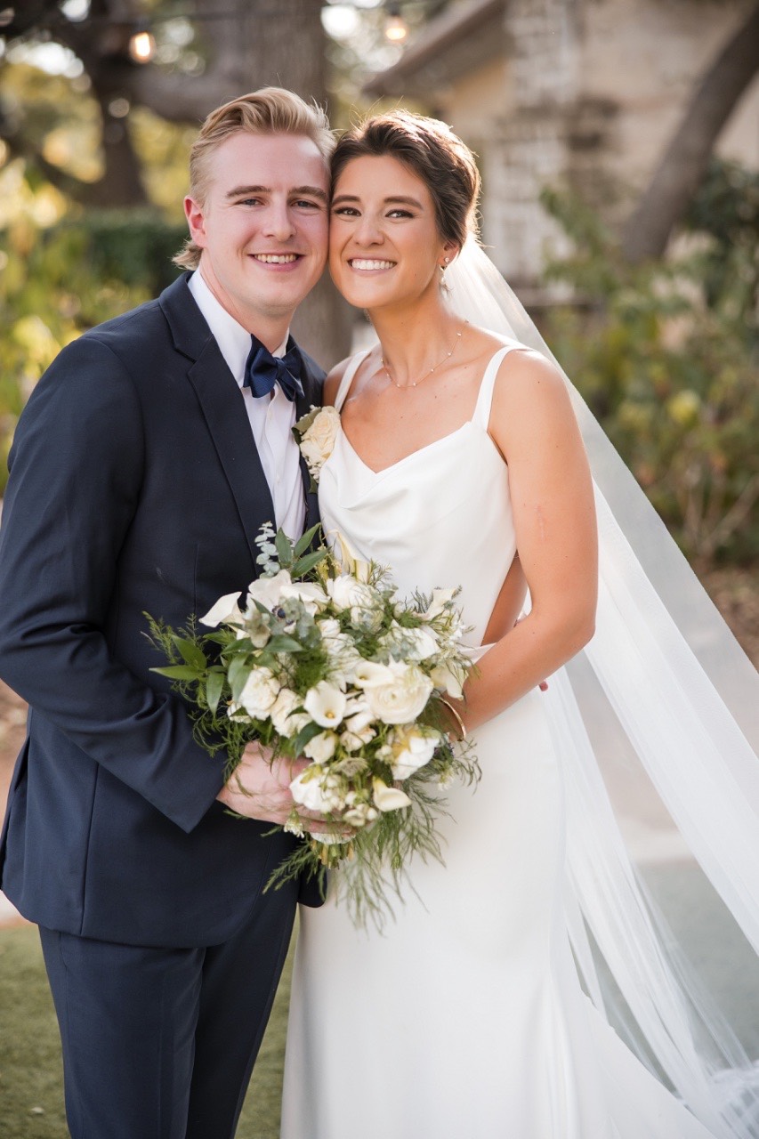 Detailed ceremony florals by wedding planner at The Retreat at Balcones Springs