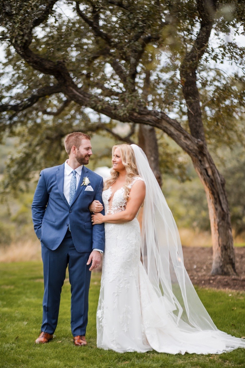 Father of bride walking K down aisle at Canyonwood Ridge Texas