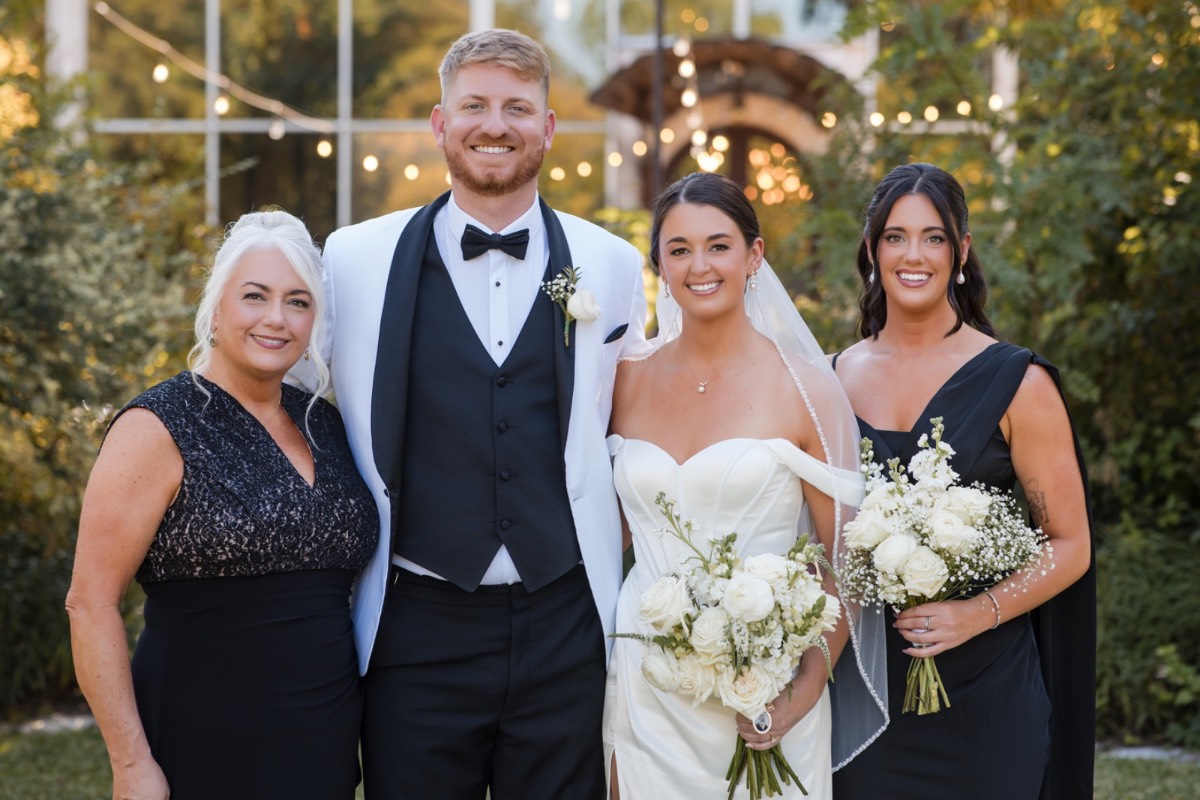 M and S exchanging vows at Barr Mansion in Austin during fall wedding
