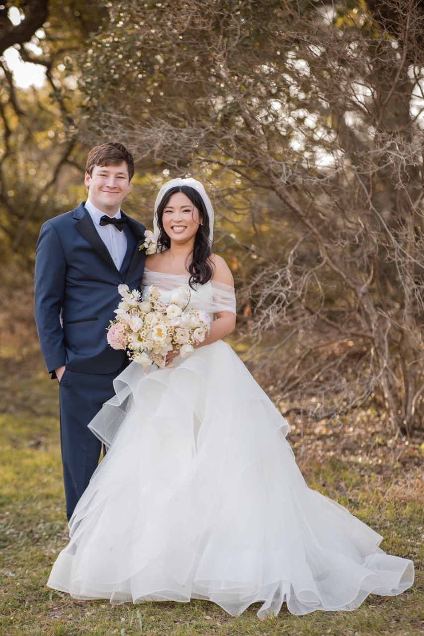 Groom M with family at Pecan Springs Ranch Austin Texas wedding day