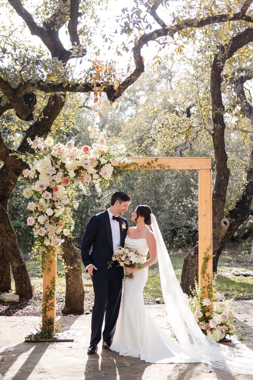 K and J sharing a laugh during their Addison Grove wedding portraits