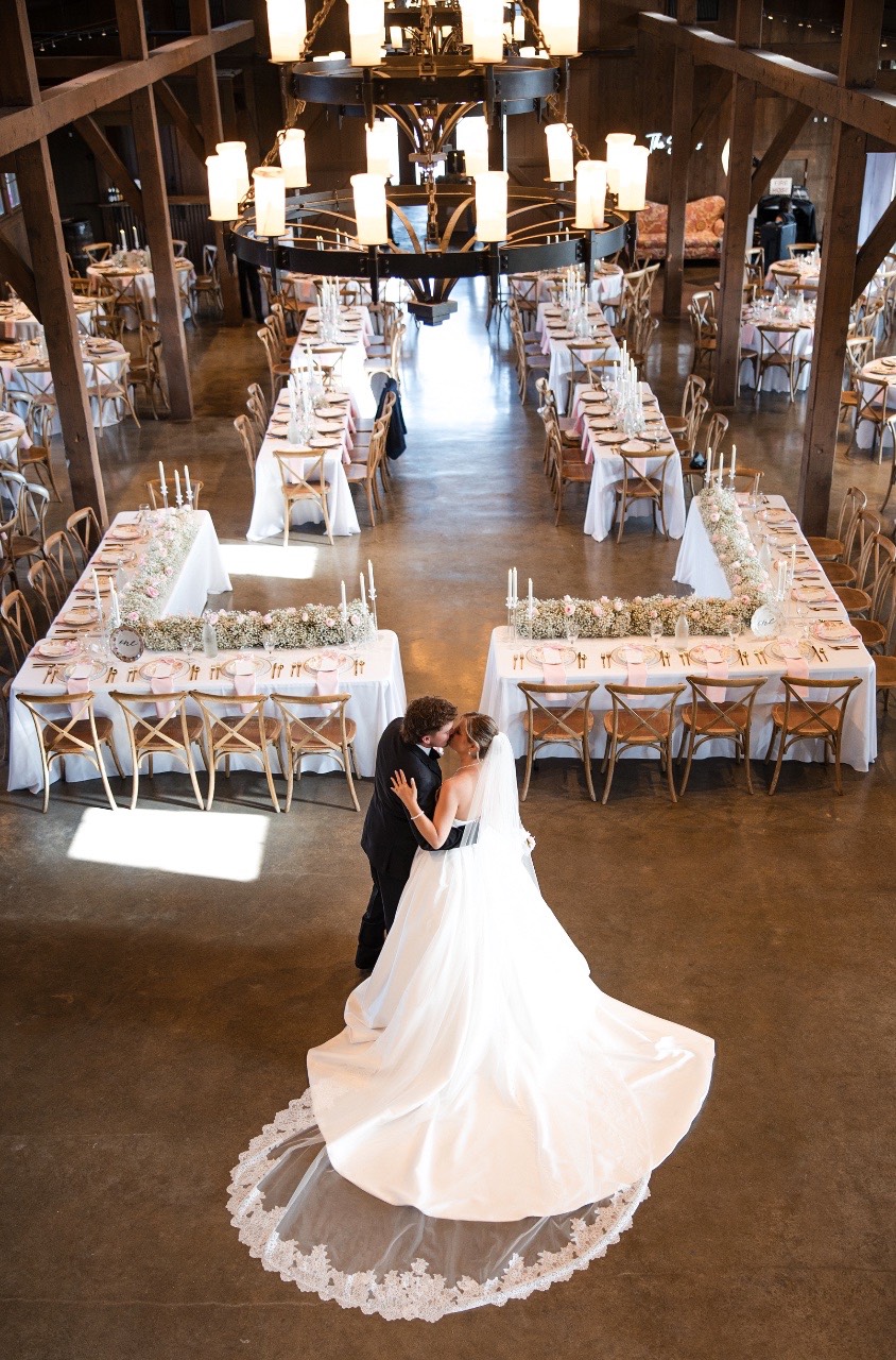 Bride and groom silhouette at sunset Hidden River Ranch wedding