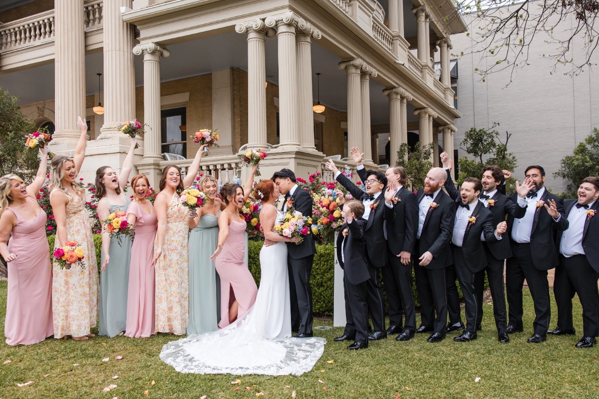 Recessional shot of K and A leaving Hotel Ella altar