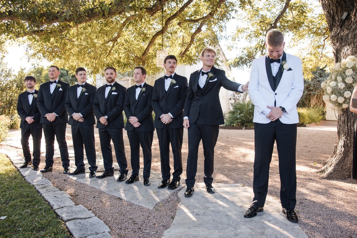 Officiant performing ceremony for M and S at Austin Barr Mansion fall wedding