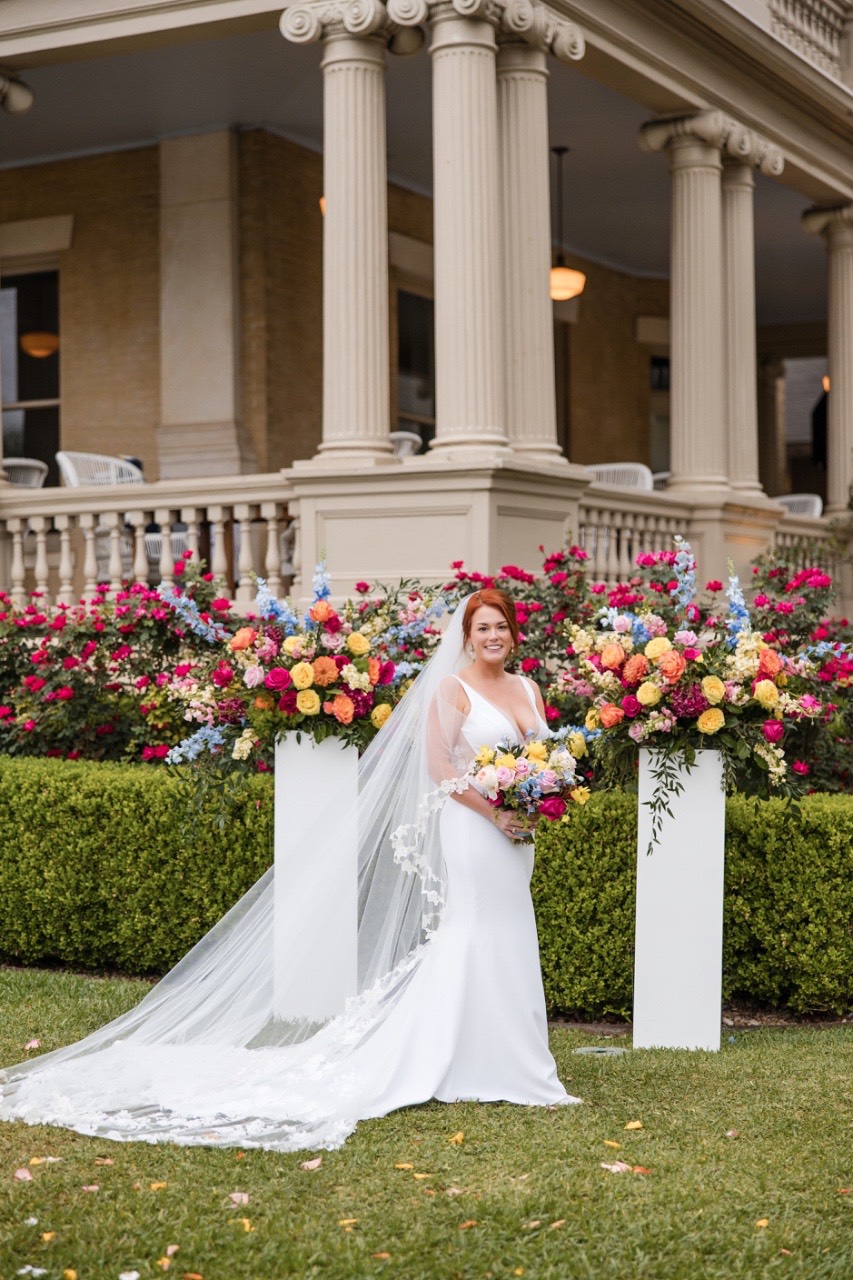 Bride and groom walking down aisle as married couple Hotel Ella