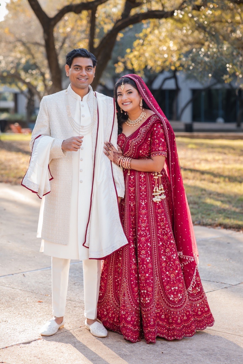 M and R's couple portrait session with Renaissance Hotel backdrop in Austin