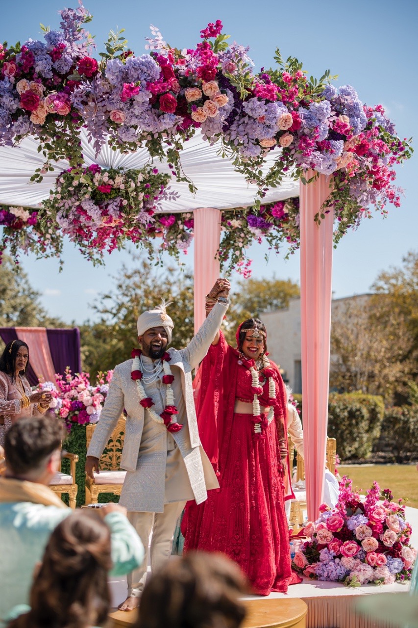 A and N exiting ceremony at Hill Country wedding venue