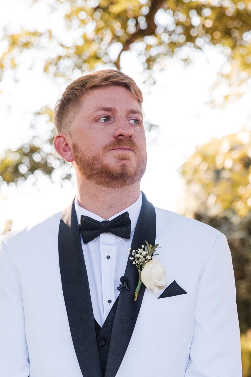 Close-up of bride's face during vows at Barr Mansion wedding ceremony