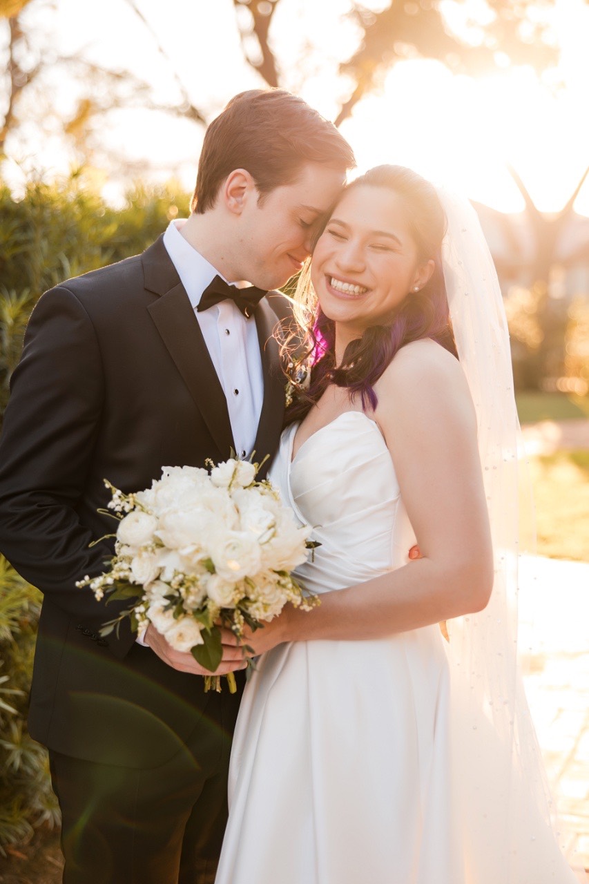 J and R laughing together during wedding day portrait session