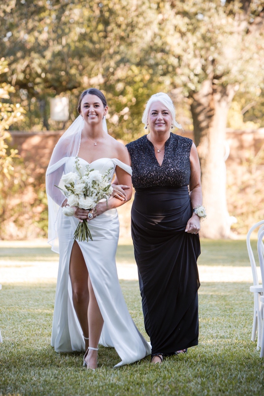 Groom's expression as bride walks toward him at fall Barr Mansion wedding