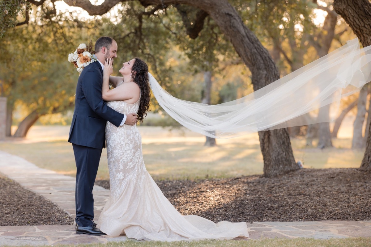 Bride's Honey Bee Floral Studio bouquet featured in romantic couple portraits
