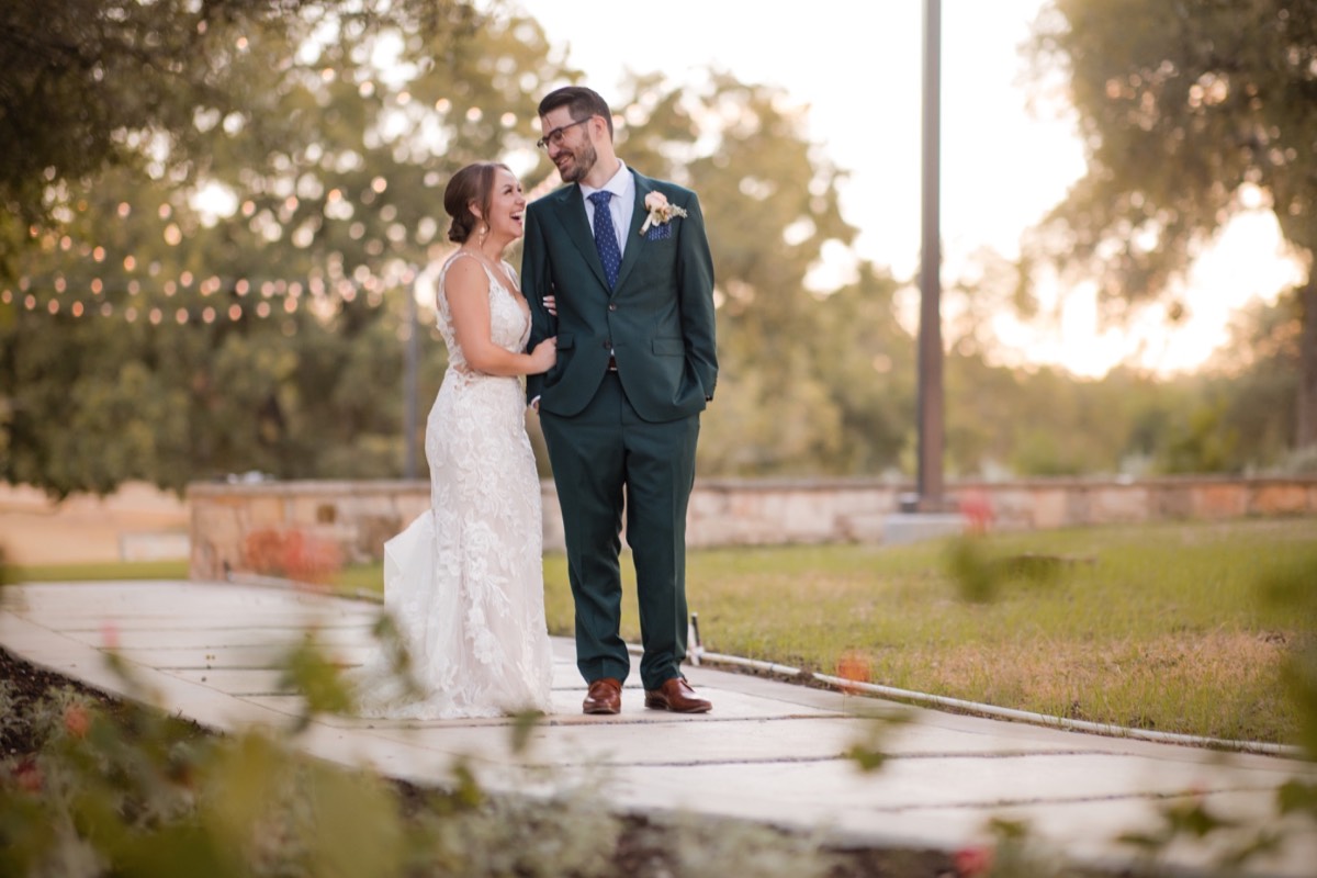 Couple portraits with Garey House historic building in Georgetown background