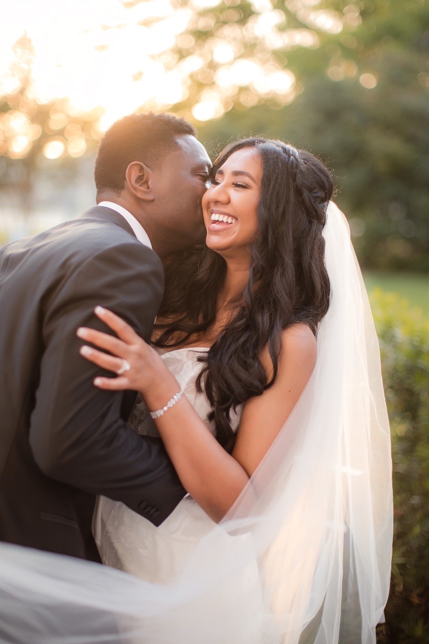 N and H dramatic couple portrait outside Woodbine Mansion Round Rock