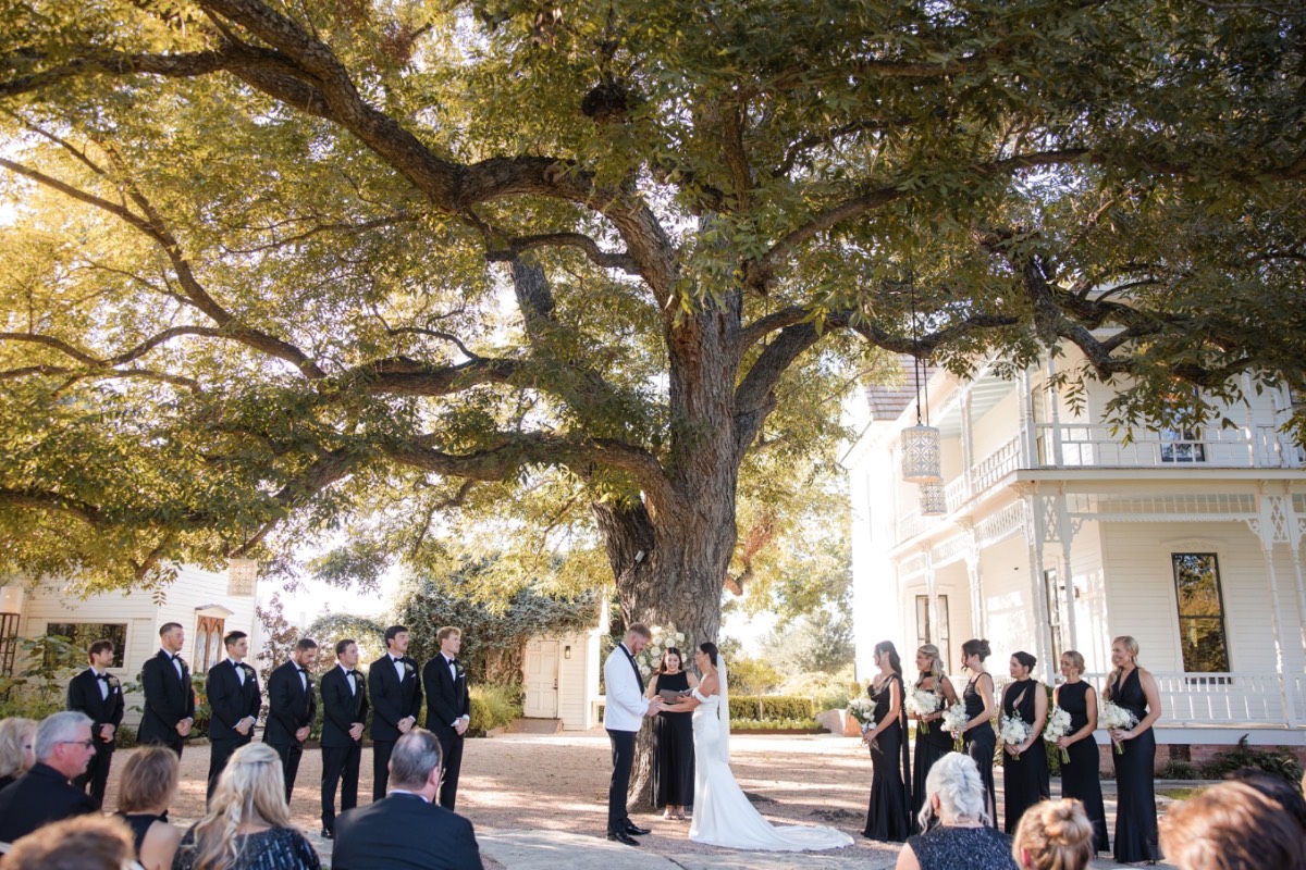 Ring exchange between M and S at Barr Mansion Austin Texas wedding