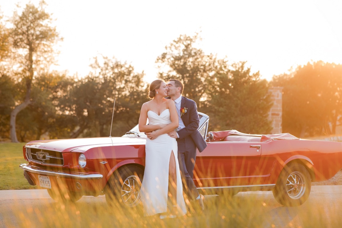 A and M silhouetted against the Texas Hill Country sky at Canyonwood Ridge
