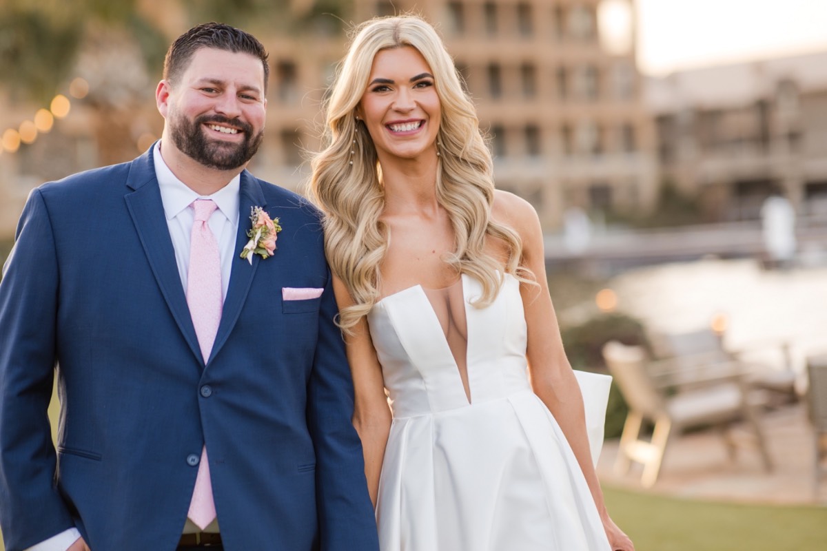 Bride A holds Joan Florals bouquet during Horseshoe Bay Resort portraits