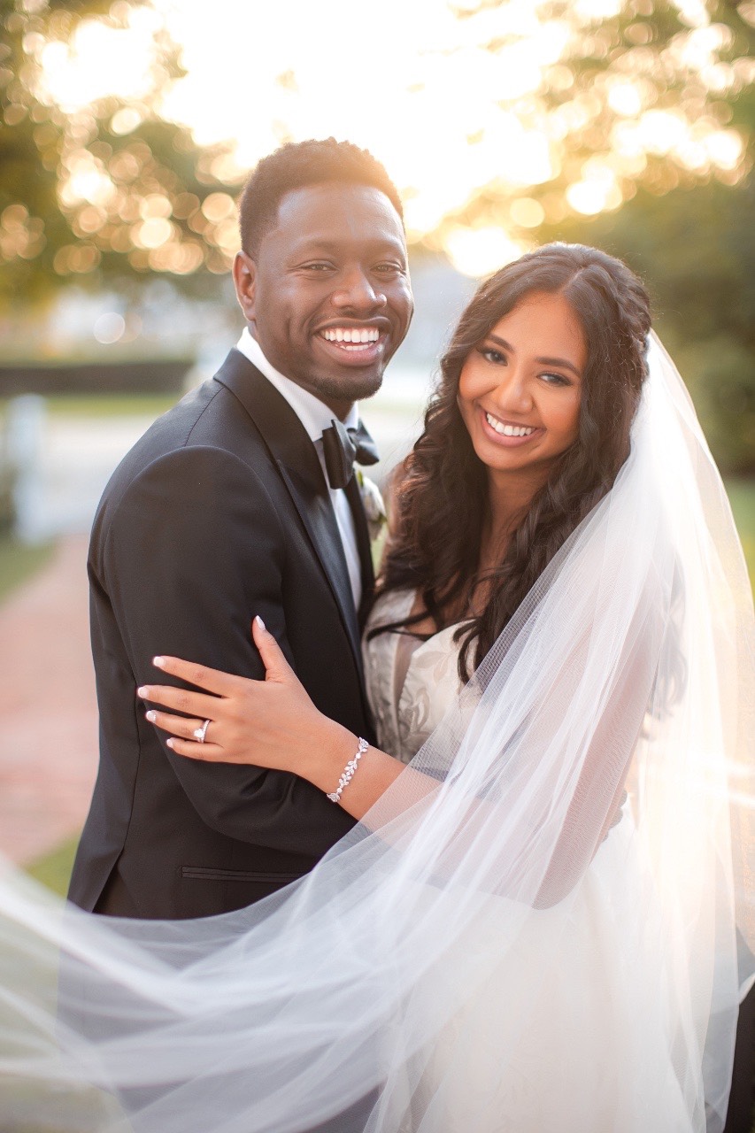 Bride N twirling dress with groom H at Woodbine Mansion venue
