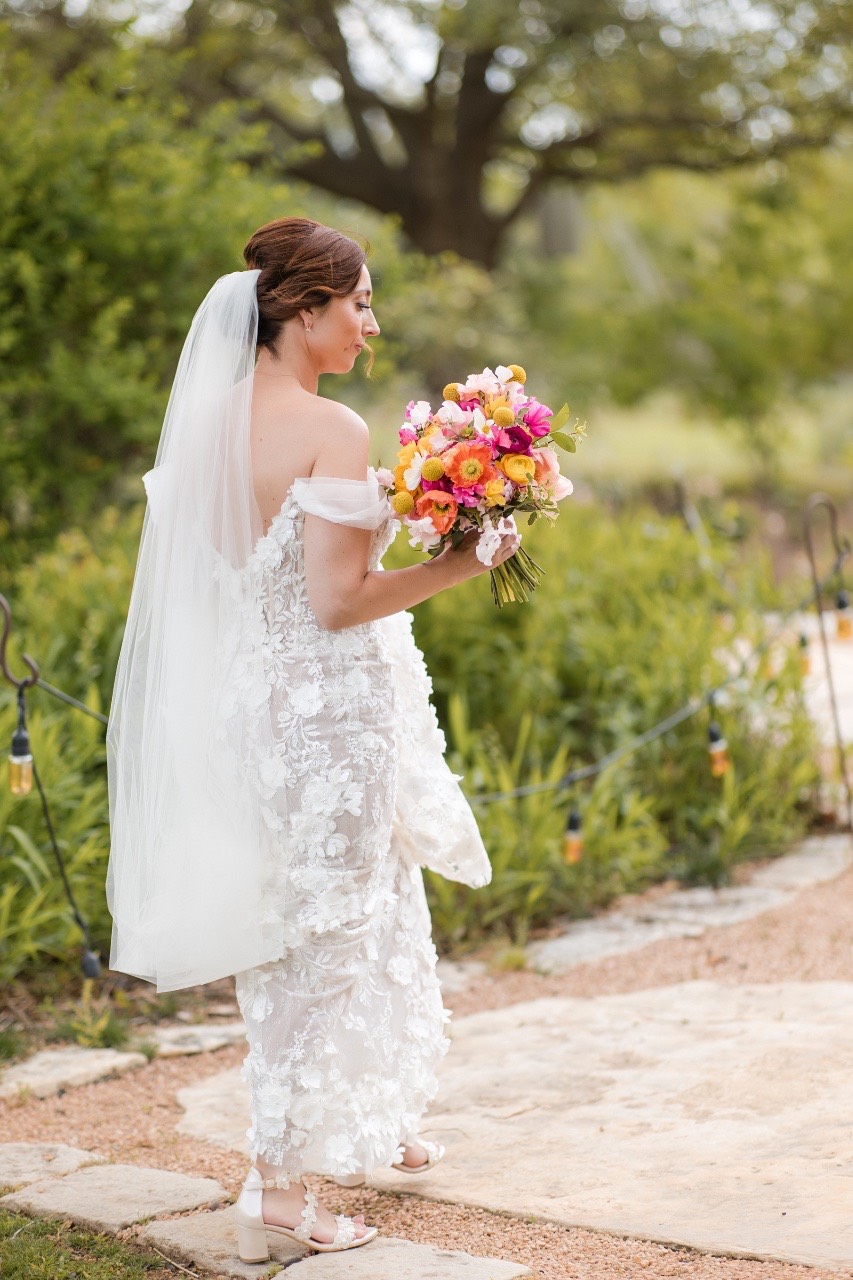 Bride L and S's intimate first look moment at Barr Mansion Austin