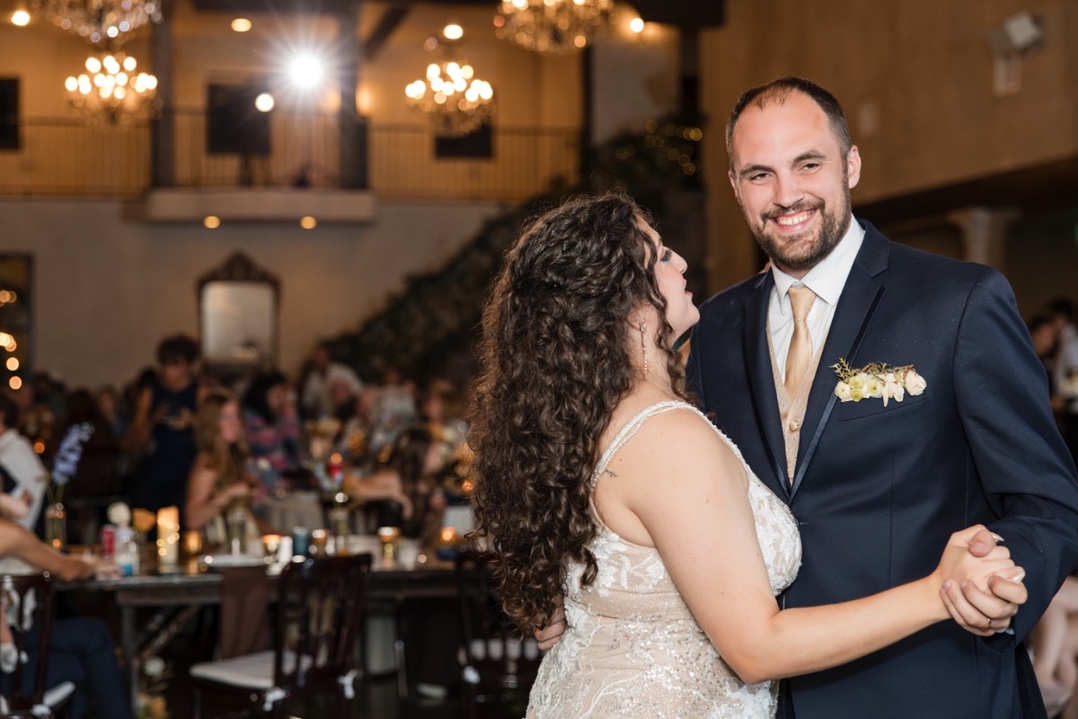 Couple silhouetted against sunset during golden hour portraits at Texas venue