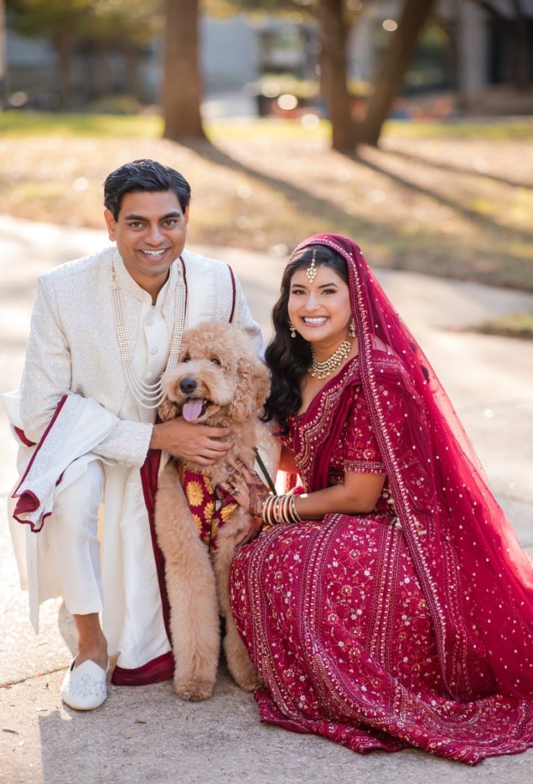 Bride and groom with their dog before their Indian Hindu wedding ceremony at the renaissance hotel in austin