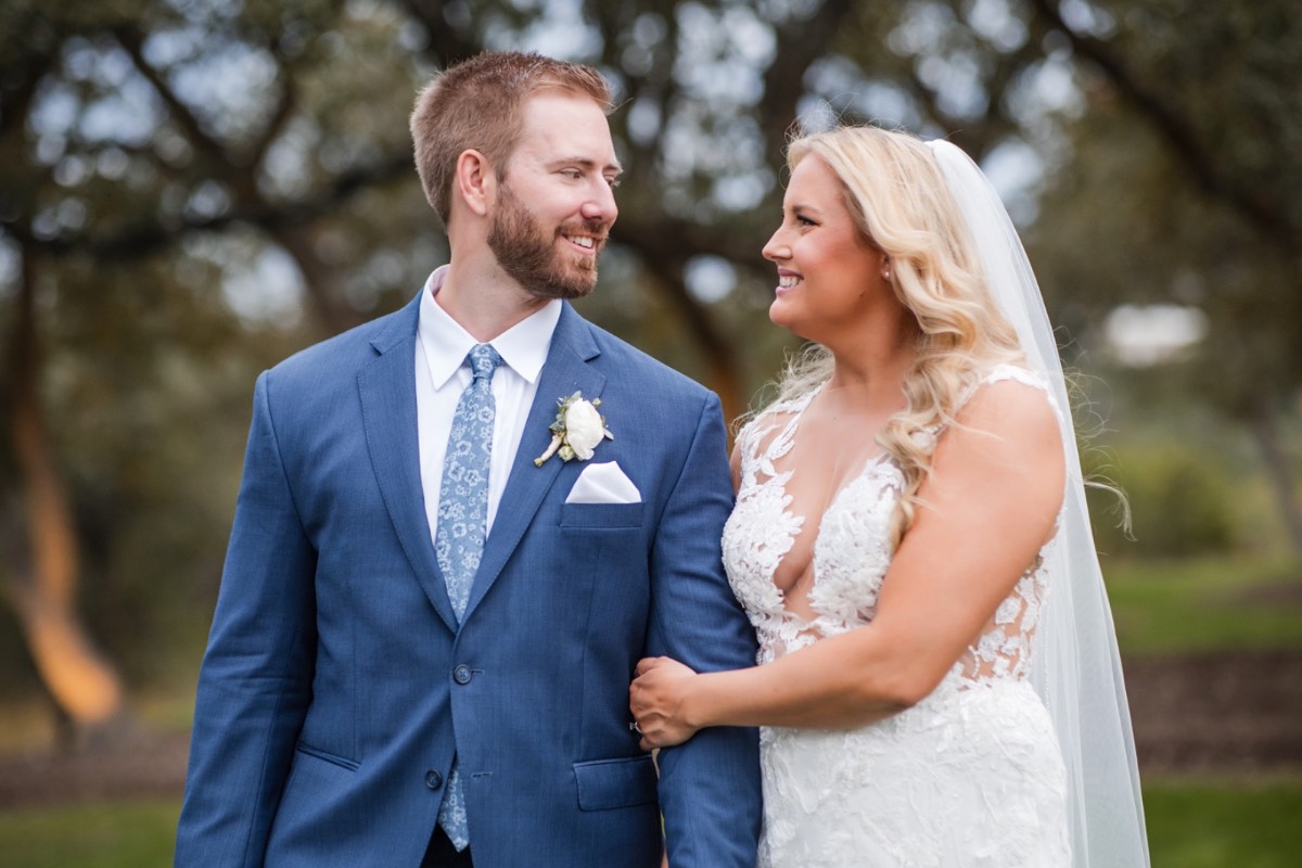 Bride and groom walking back up aisle at Canyonwood Ridge Texas