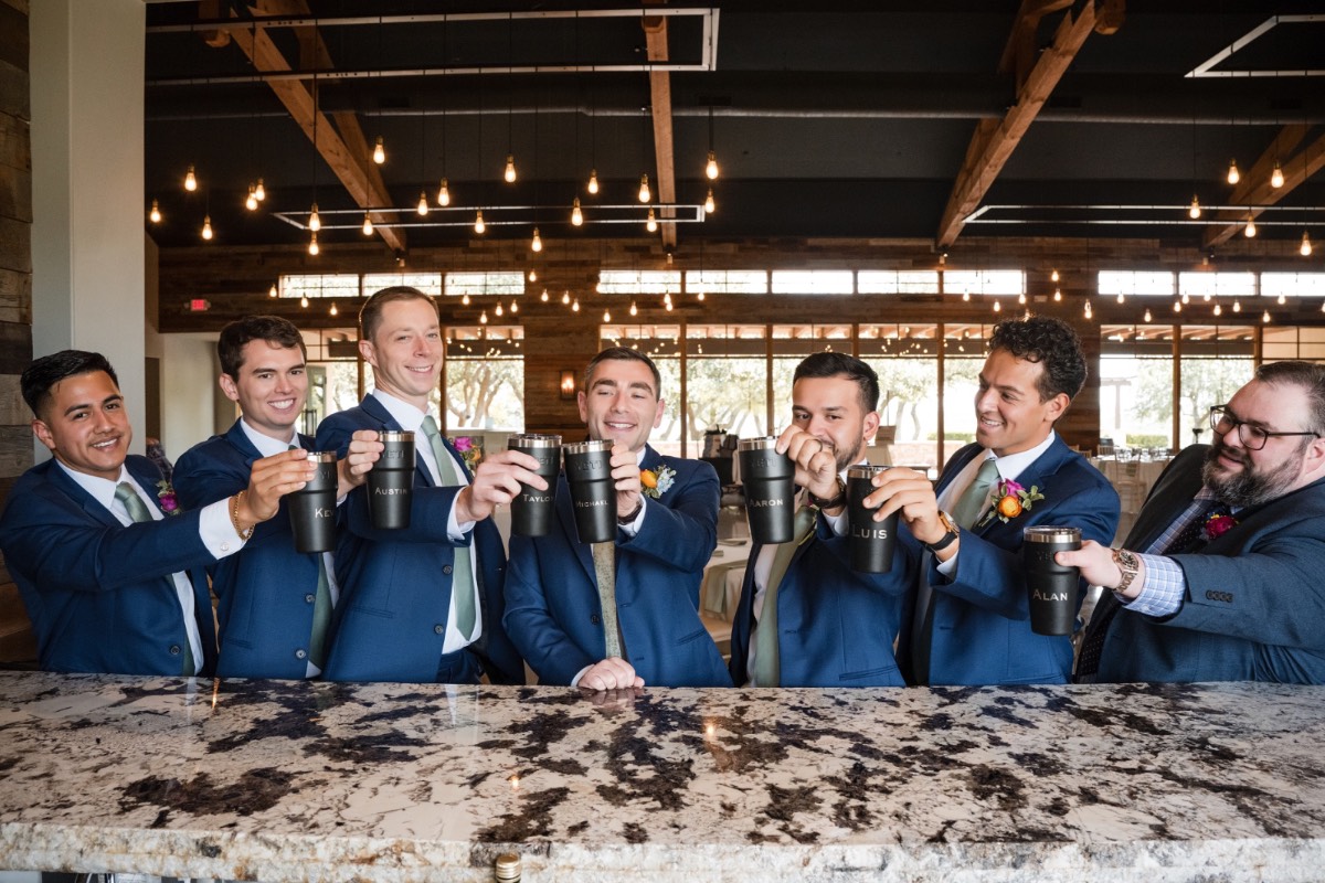 Bride A laughing with bridesmaids during getting-ready photos by The Bird and The Bear