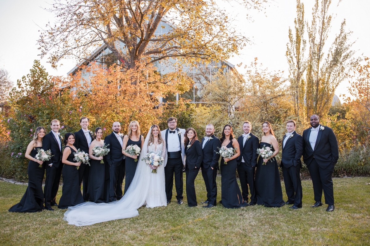 Couple silhouetted against Barr Mansion architecture during winter wedding Austin.