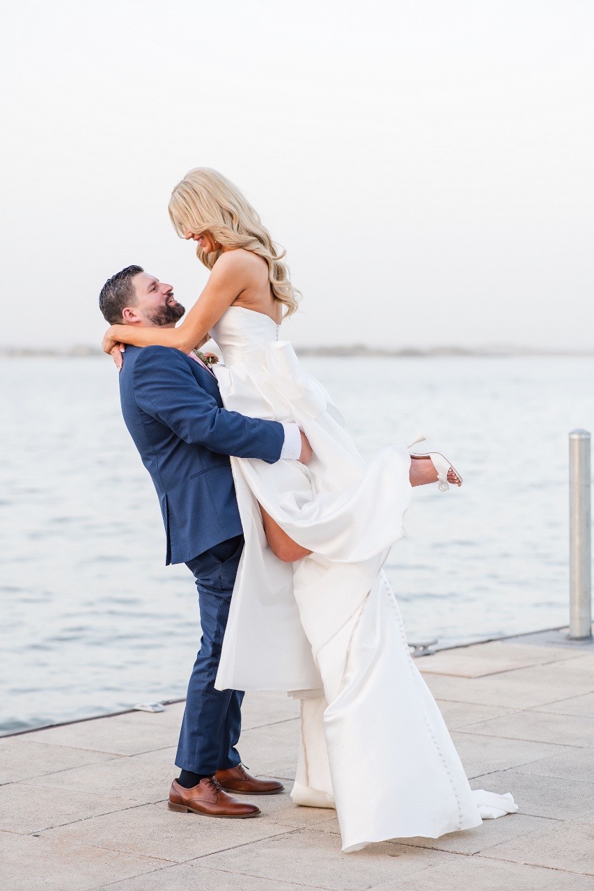 Bride and groom silhouette at Horseshoe Bay Resort during golden hour