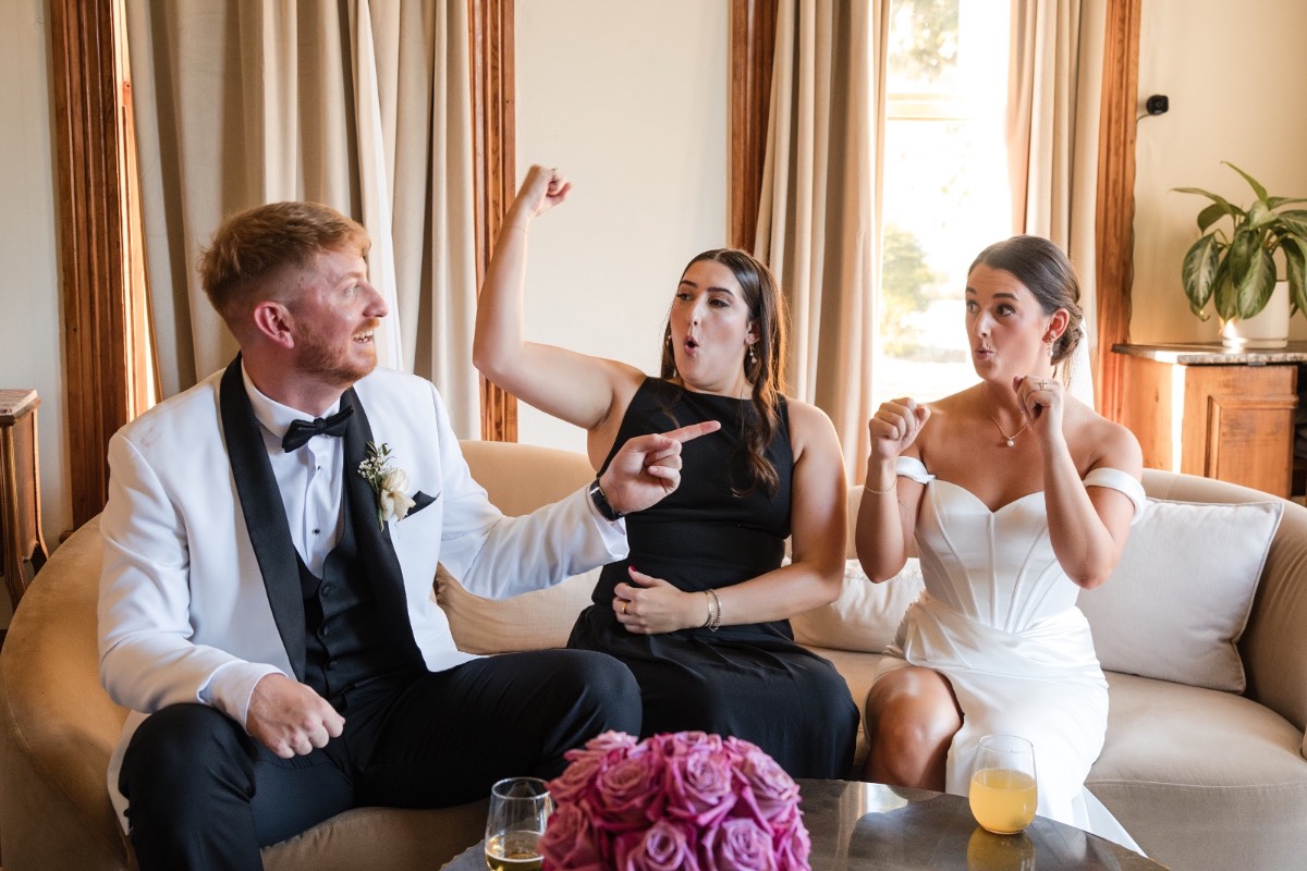 Bride and groom portraits at Barr Mansion with Austin city backdrop for fall wedding