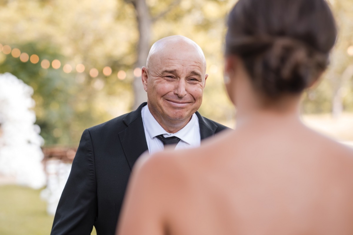 Late night dancing under lights at Pecan Springs Ranch Austin wedding