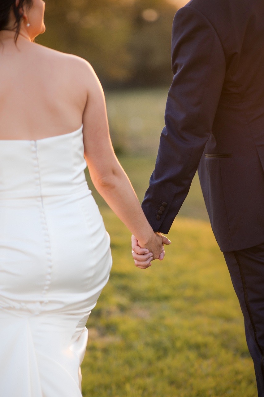 Bride and groom greeting guests during cocktail hour at Addison Grove Austin