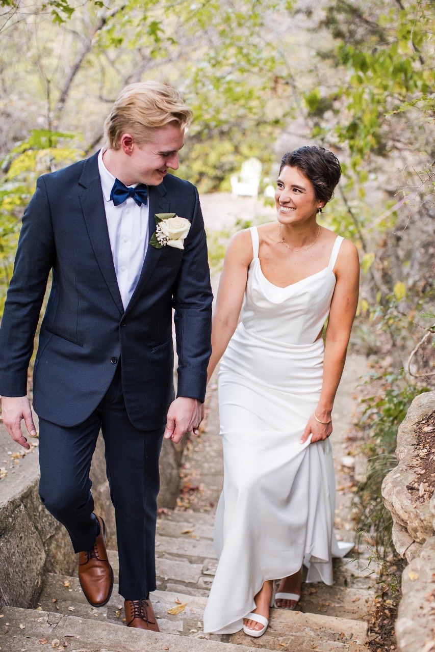 Couple sharing intimate moment during Marble Falls wedding day portraits