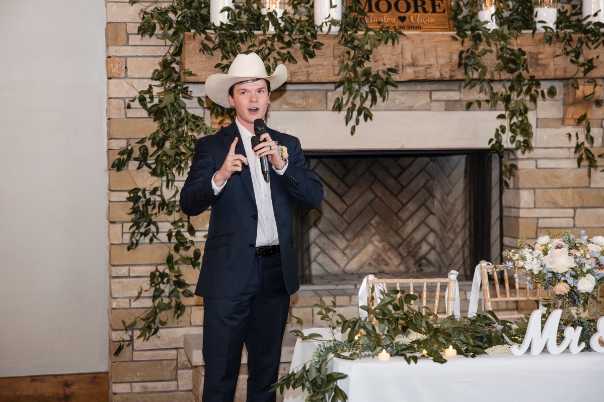 Groom's family portraits at scenic Canyonwood Ridge outdoor wedding in Texas