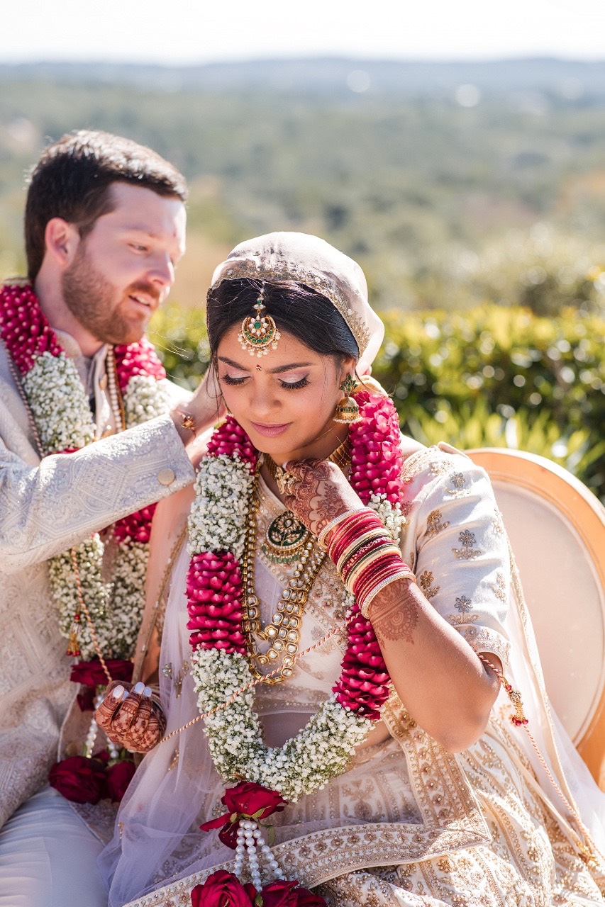 Couple with wedding party at Canyonwood Ridge venue in Texas