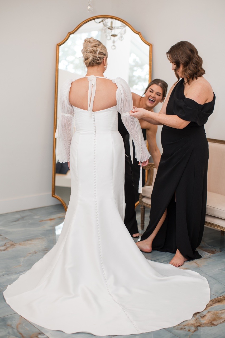 Wedding party celebrating after Cora and Cameron's Wimberley ceremony