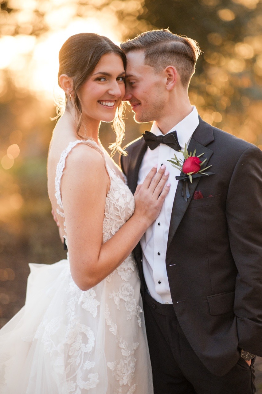 Couple's first kiss as married pair at Barr Mansion.