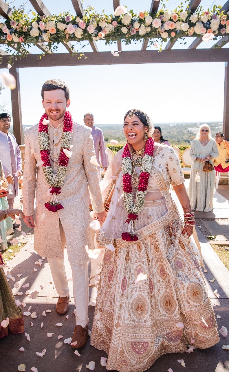 Groomsmen and bridesmaids group photo at Indian wedding celebration